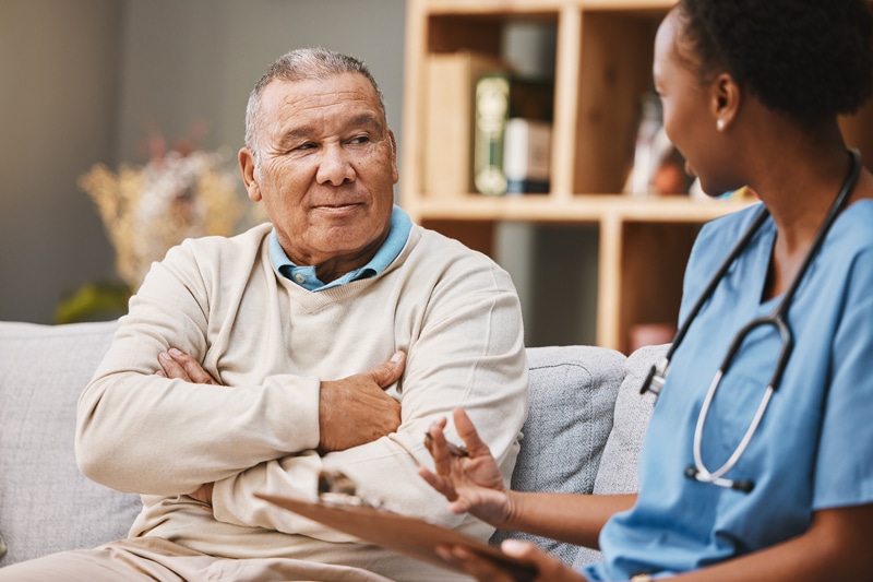 Man talking to a health professional